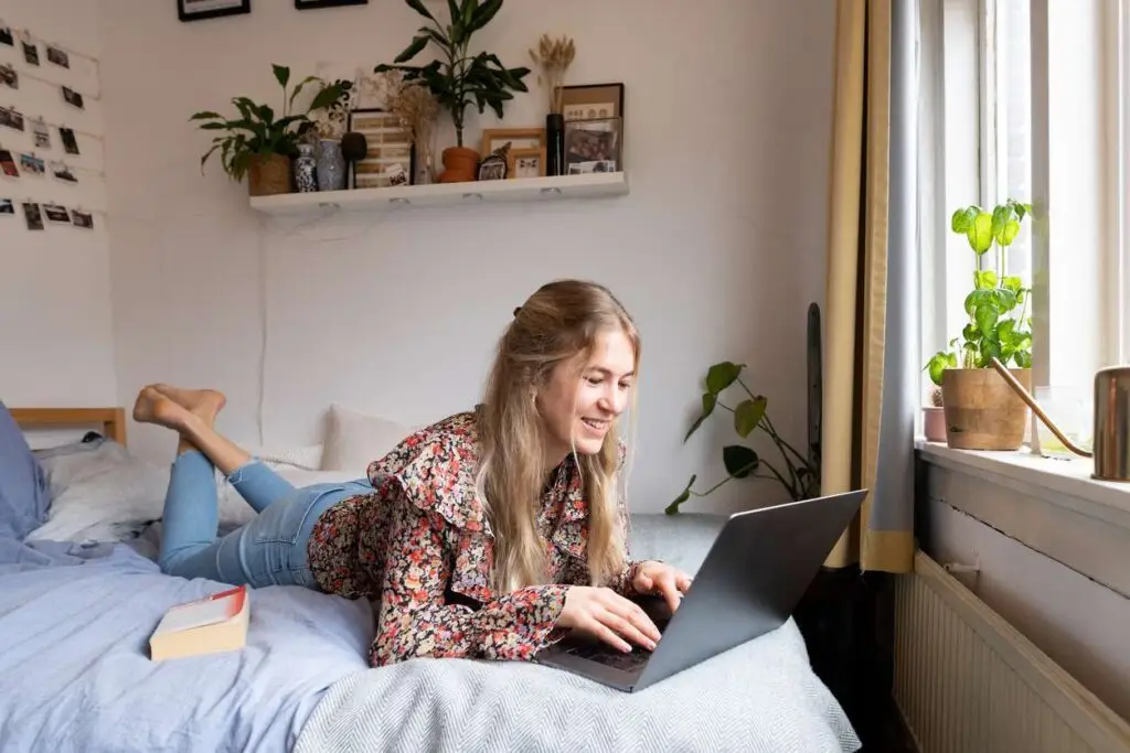 Woman-Studying-in-Dorm-Room - Your Savvy Purse