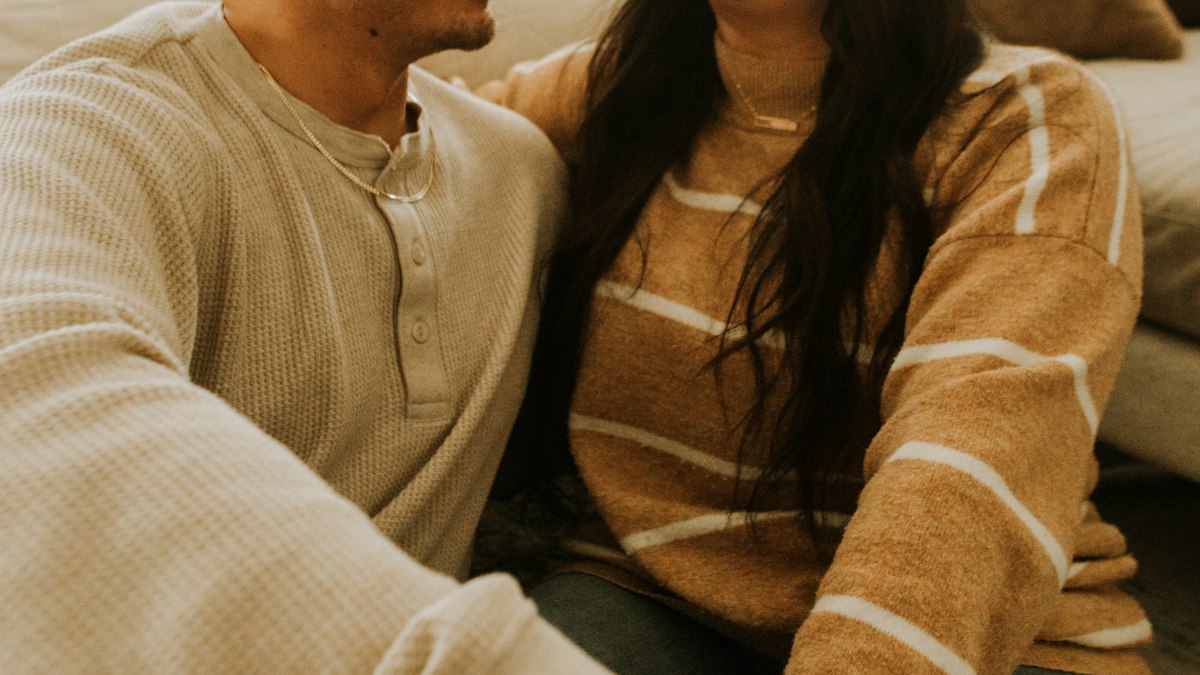 A man and woman laughing together